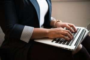 person using macbook air
